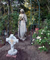 religious statues and roses